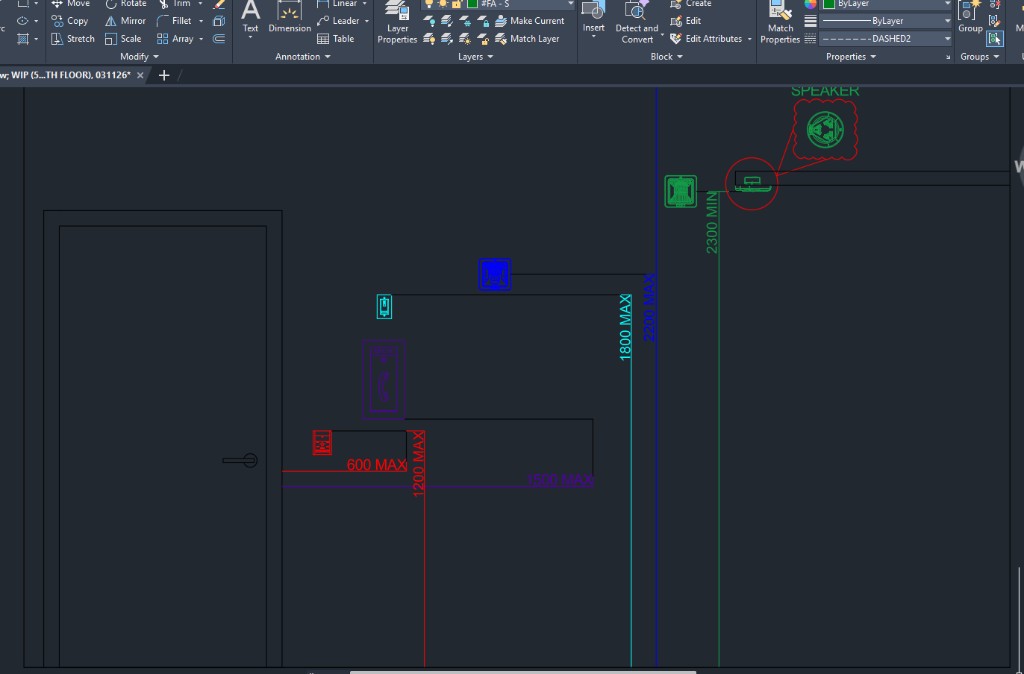 AutoCAD elevation showing fire alarm device mounting heights beside a door