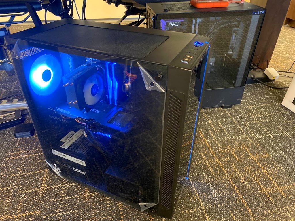 Air-cooled PC build with blue fan lighting and GeForce RTX graphics card