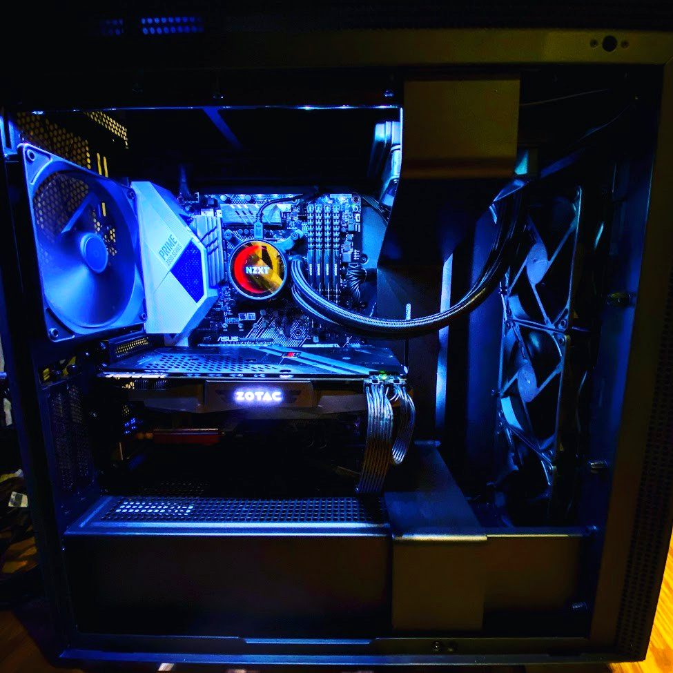 Blue-lit liquid-cooled PC build in an NZXT case