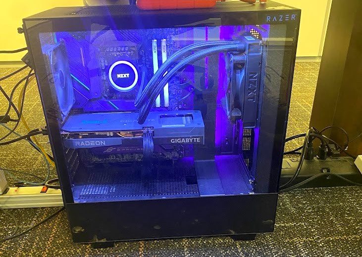 Razer edition NZXT case with purple lighting and liquid cooling